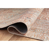 Durable, low pile, and soft underfoot, this rug is inspired by classic vintage and antique rugs. The Jules Chris Loves Julia Tangerine / Mist rug from Loloi features a beautiful vintage pattern and patina. The rug is easy to clean and maintain and perfect for living rooms, dining rooms, hallways, and kitchens!