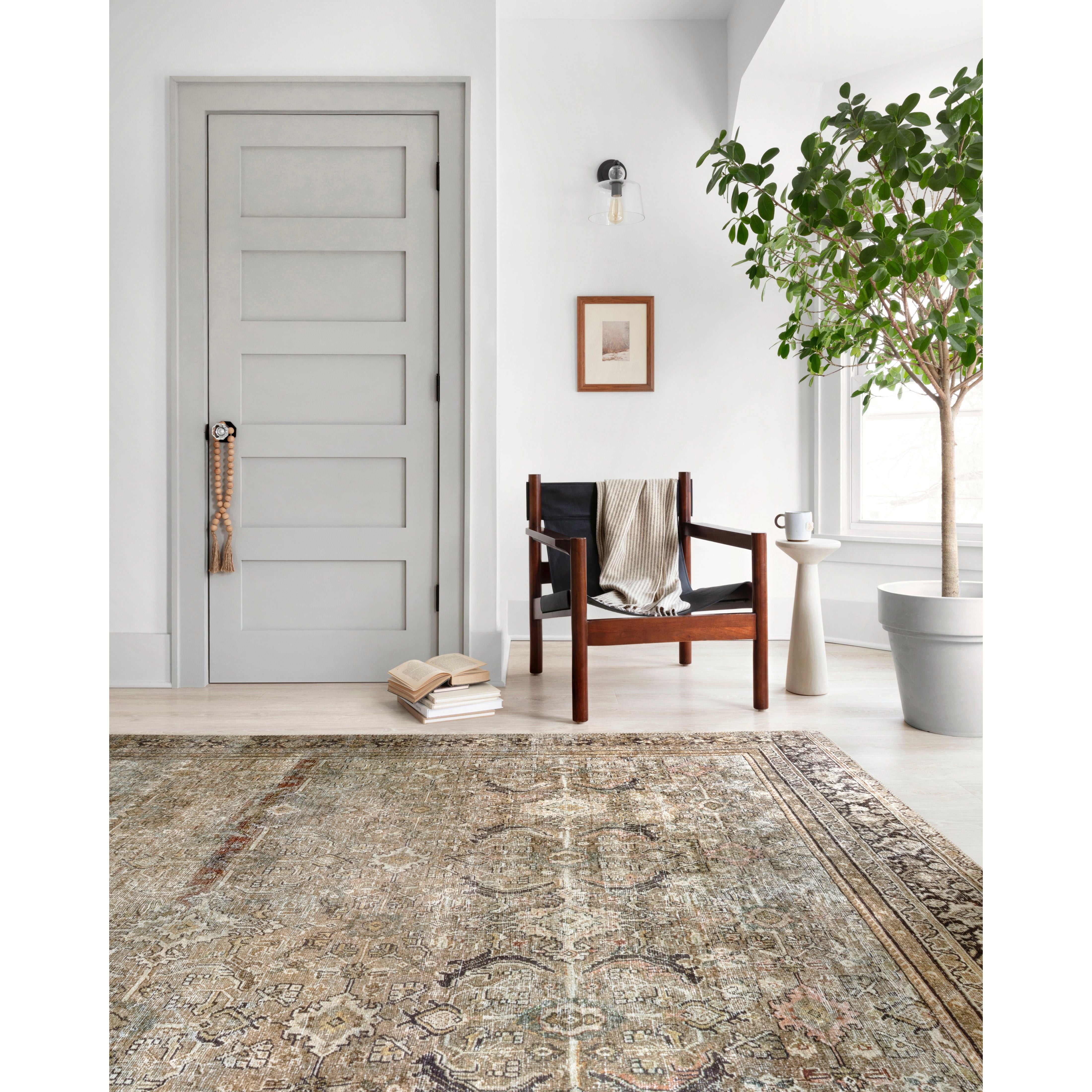 Perfect for families with kids and pets and very easy to clean and maintain. Comes in area, cute kitchen and hallway runner sizes. The rug is gorgeous with an intricate pattern and warms up the room with beautiful color tones. The Layla Olive/Charcoal LAY-03 rug from Loloi captures the spirit of an old-world rug. Amethyst Home provides interior design, new construction, custom furniture, and rugs for the Omaha and Lincoln metro area.