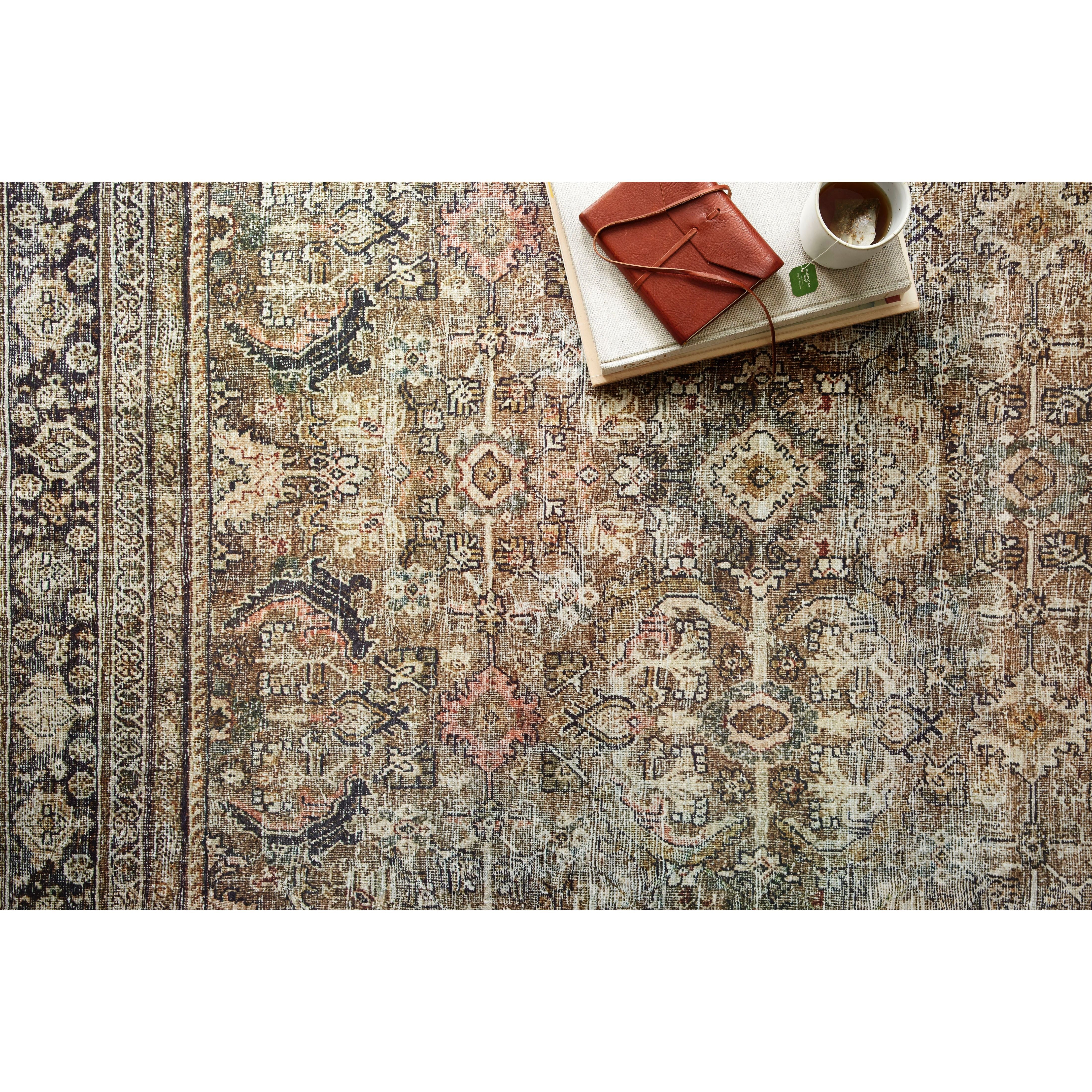 Perfect for families with kids and pets and very easy to clean and maintain. Comes in area, cute kitchen and hallway runner sizes. The rug is gorgeous with an intricate pattern and warms up the room with beautiful color tones. The Layla Olive/Charcoal LAY-03 rug from Loloi captures the spirit of an old-world rug. Amethyst Home provides interior design, new construction, custom furniture, and rugs for the Philadelphia metro area.