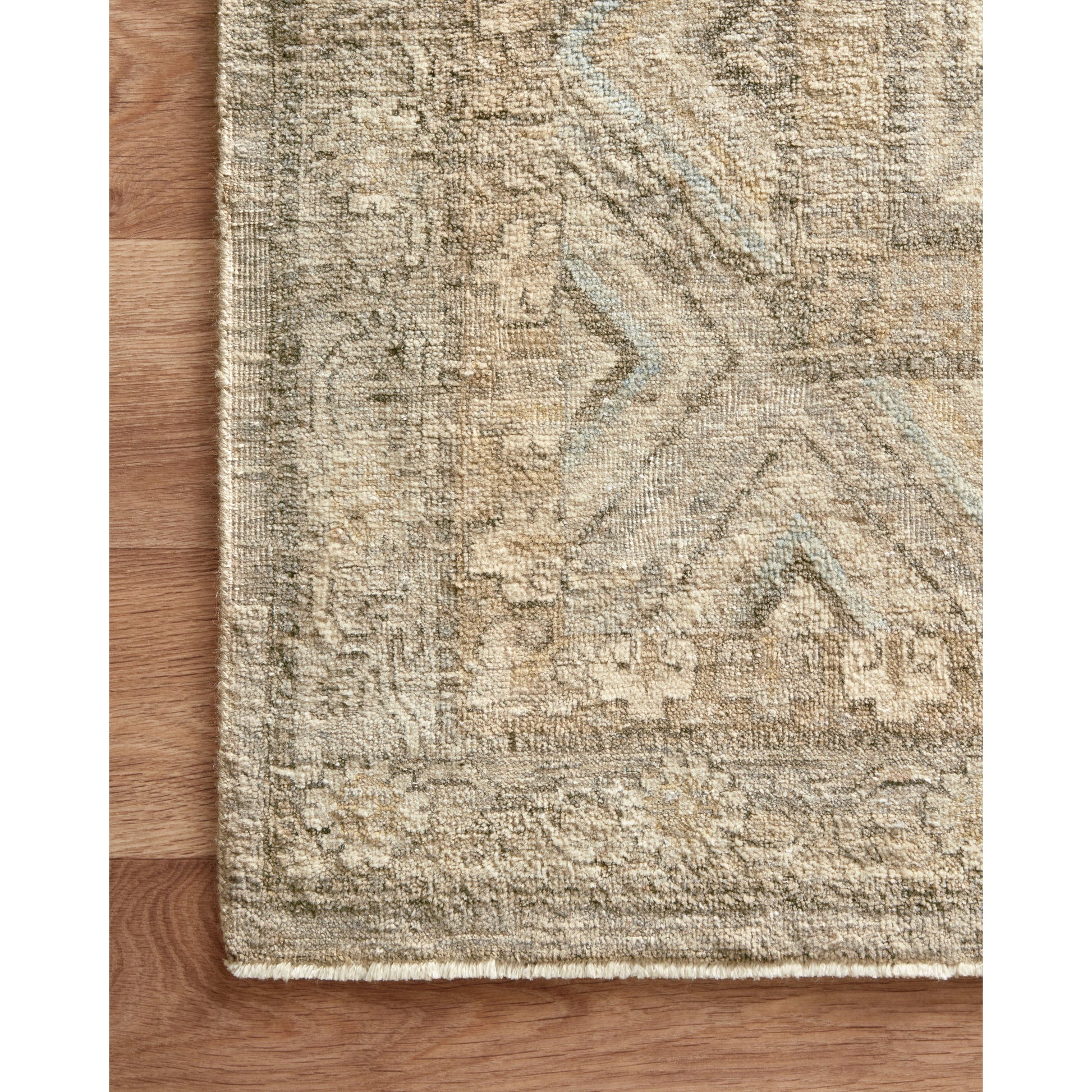 The Legacy Ash LZ-06 Rug from Loloi is hand-knotted, refined, yet versatile for hallways, living rooms, bedrooms, and extra large spaces. The Legacy rug is deliberately distressed and sheared down to an extra low pile of 100% wool, creating a patina usually only imparted through decades of wear. Amethyst Home provides interior design, new construction, custom furniture, and rugs for the Chicago metro area.