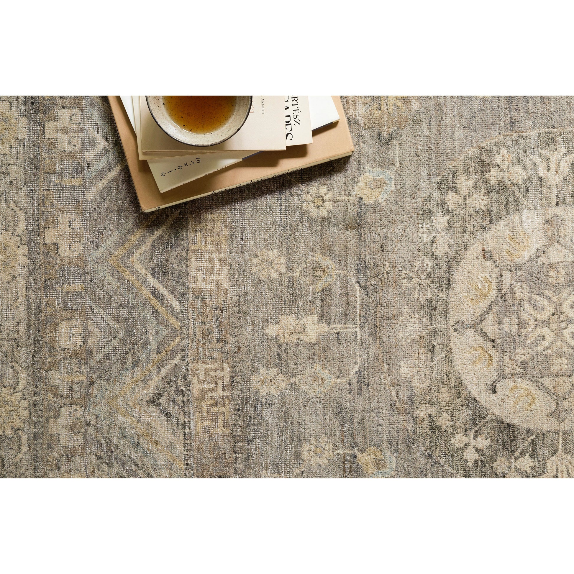 The Legacy Ash LZ-06 Rug from Loloi is hand-knotted, refined, yet versatile for hallways, living rooms, bedrooms, and extra large spaces. The Legacy rug is deliberately distressed and sheared down to an extra low pile of 100% wool, creating a patina usually only imparted through decades of wear. Amethyst Home provides interior design, new construction, custom furniture, and rugs for the Miami metro area.