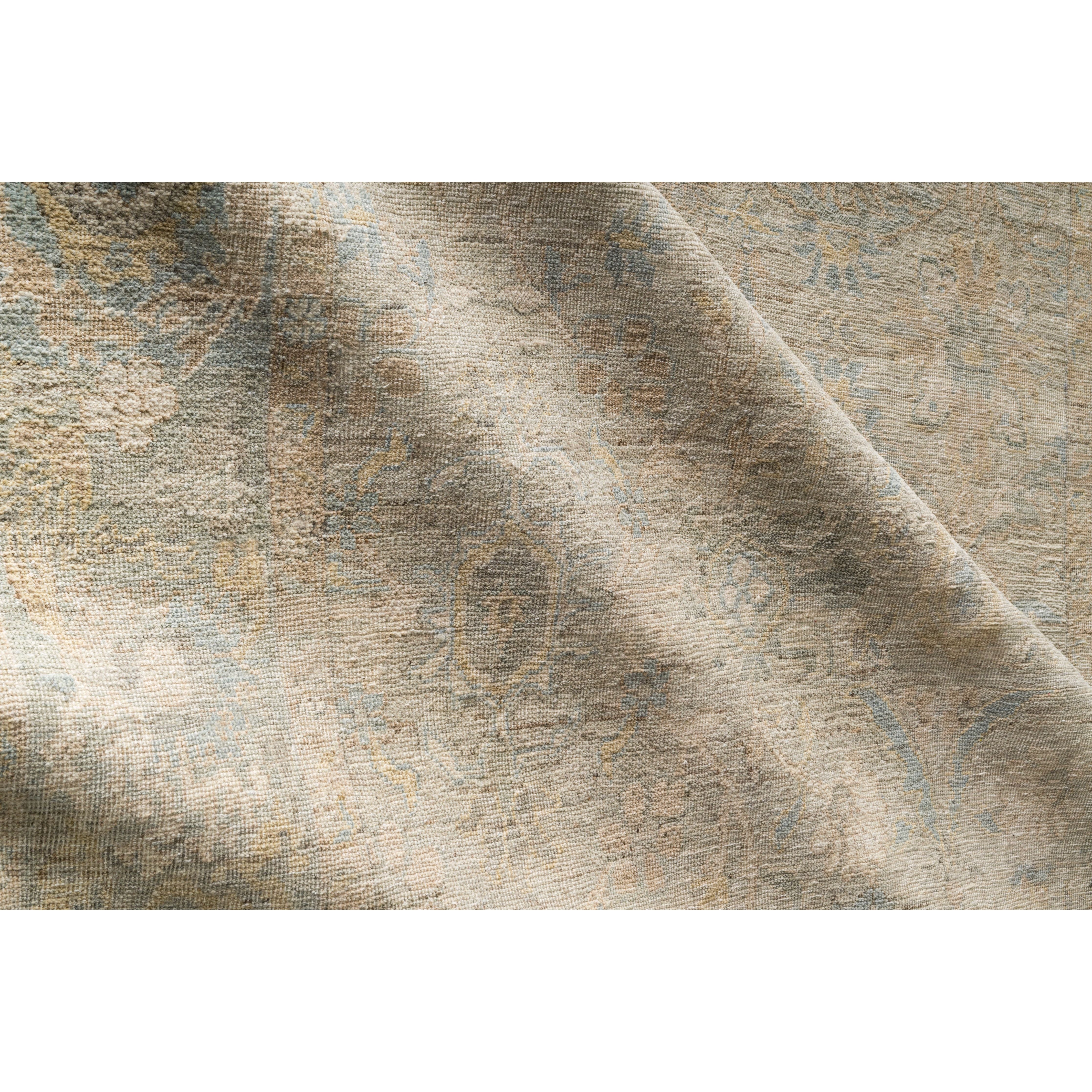 The Legacy Ash/Lagoon LZ-01 Rug from Loloi is hand-knotted, refined, yet versatile for hallways, living rooms, bedrooms, and extra large spaces. The Legacy rug is deliberately distressed and sheared down to an extra low pile of 100% wool, creating a patina usually only imparted through decades of wear. Amethyst Home provides interior design, new construction, custom furniture, and rugs for the Scottsdale metro area.