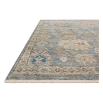The Legacy Blue / Multi LZ-10 Rug from Loloi is hand-knotted, refined, yet versatile for hallways, living rooms, bedrooms, and extra large spaces. The Legacy rug is deliberately distressed and sheared down to an extra low pile of 100% wool, creating a patina usually only imparted through decades of wear. Amethyst Home provides interior design, new construction, custom furniture, and rugs for the Columbus and Canton, Ohio metro area.