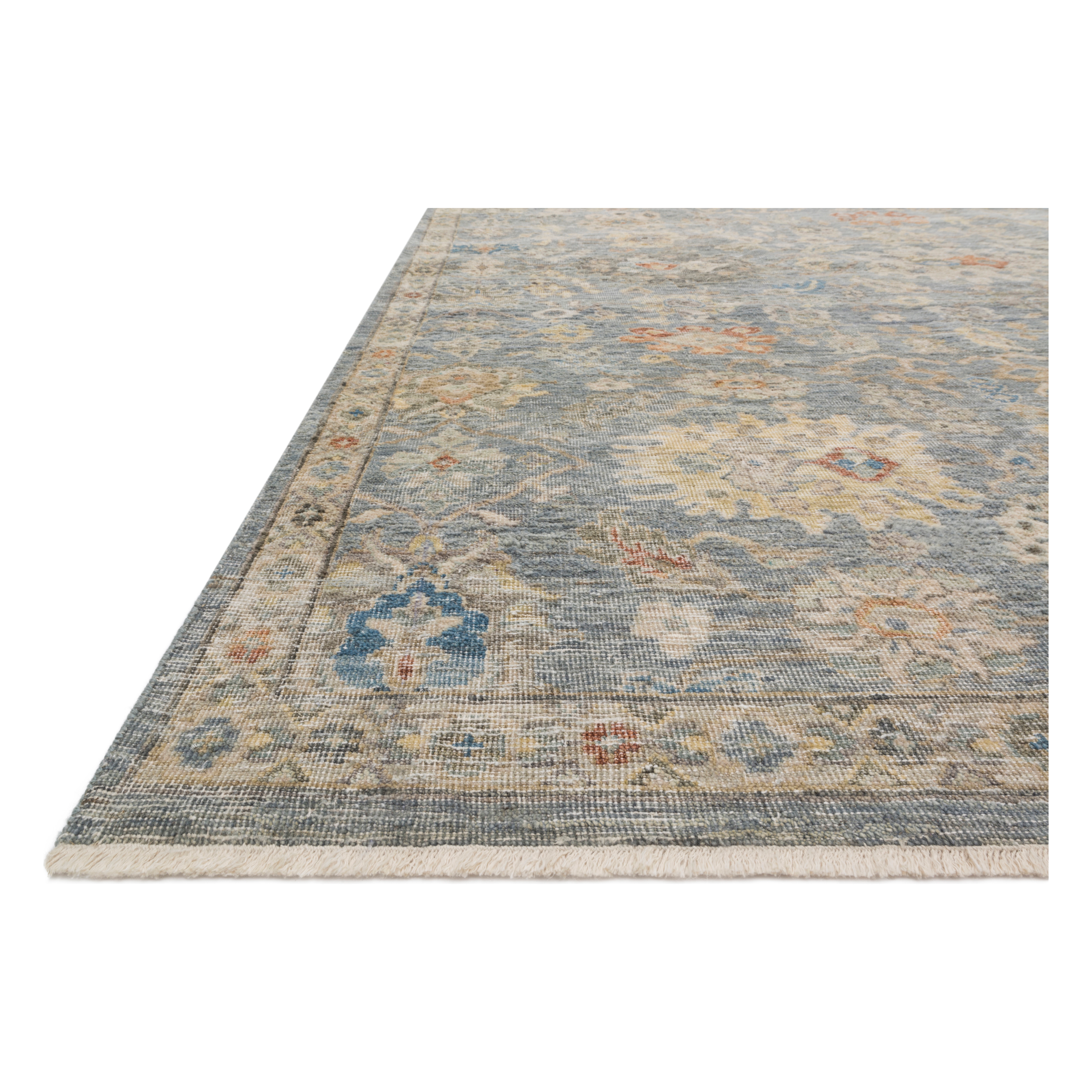 The Legacy Blue / Multi LZ-10 Rug from Loloi is hand-knotted, refined, yet versatile for hallways, living rooms, bedrooms, and extra large spaces. The Legacy rug is deliberately distressed and sheared down to an extra low pile of 100% wool, creating a patina usually only imparted through decades of wear. Amethyst Home provides interior design, new construction, custom furniture, and rugs for the Columbus and Canton, Ohio metro area.