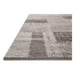 Featuring Manfred Charcoal / Dove Hand-Knotted Rug by Loloi at Amethyst Home. Each area rug in the Manfred Charcoal / Dove Rug collection is meticulously hand-knotted with a technique that creates a high-low texture, adding visual depth and movement. The rug’s patchwork design is casually sophisticated, fitting into living rooms, bedrooms, and dens—anywhere a t. Amethyst Home provides interior design, new home construction design consulting, vintage area rugs, and lighting in the Omaha metro area.