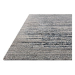 Featuring Raquel Denim / Grey Rug by Loloi at Amethyst Home. The Raquel Collection exemplifies what makes a hand-knotted rug so unique. Each area rug has a ribbed texture and subtle striping created by the artisan’s cut-and-loop technique. Raquel features an organic, asymmetrical linear pattern in an airy, neutral palette. With both an elevated look and fe. Amethyst Home provides interior design, new home construction design consulting, vintage area rugs, and lighting in the Washington metro area.