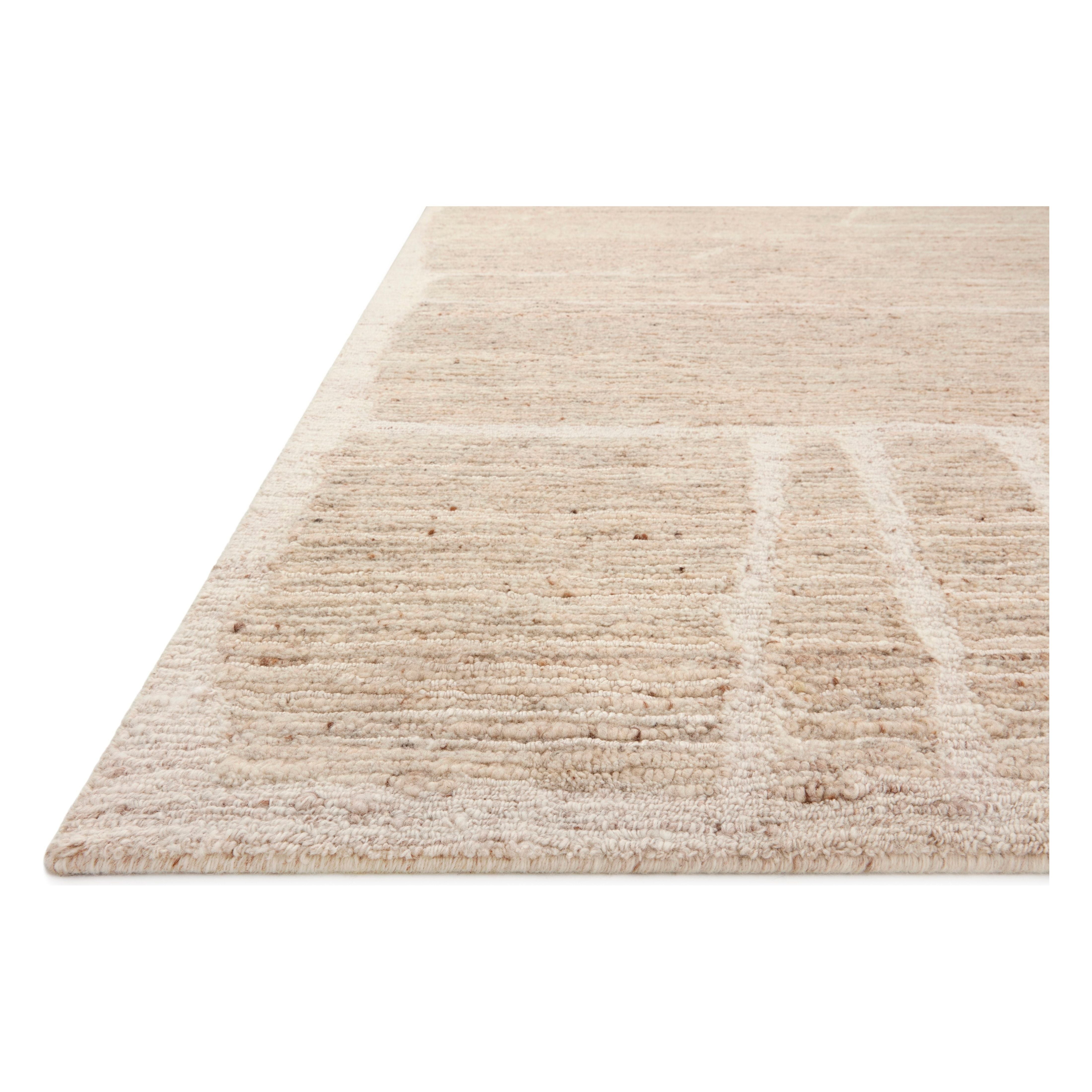 Featuring Raquel Oatmeal / Sand Rug by Loloi at Amethyst Home. The Raquel Collection exemplifies what makes a hand-knotted rug so unique. Each area rug has a ribbed texture and subtle striping created by the artisan’s cut-and-loop technique. Raquel features an organic, asymmetrical linear pattern in an airy, neutral palette. With both an elevated look and f. Amethyst Home provides interior design, new home construction design consulting, vintage area rugs, and lighting in the Charlotte metro area.