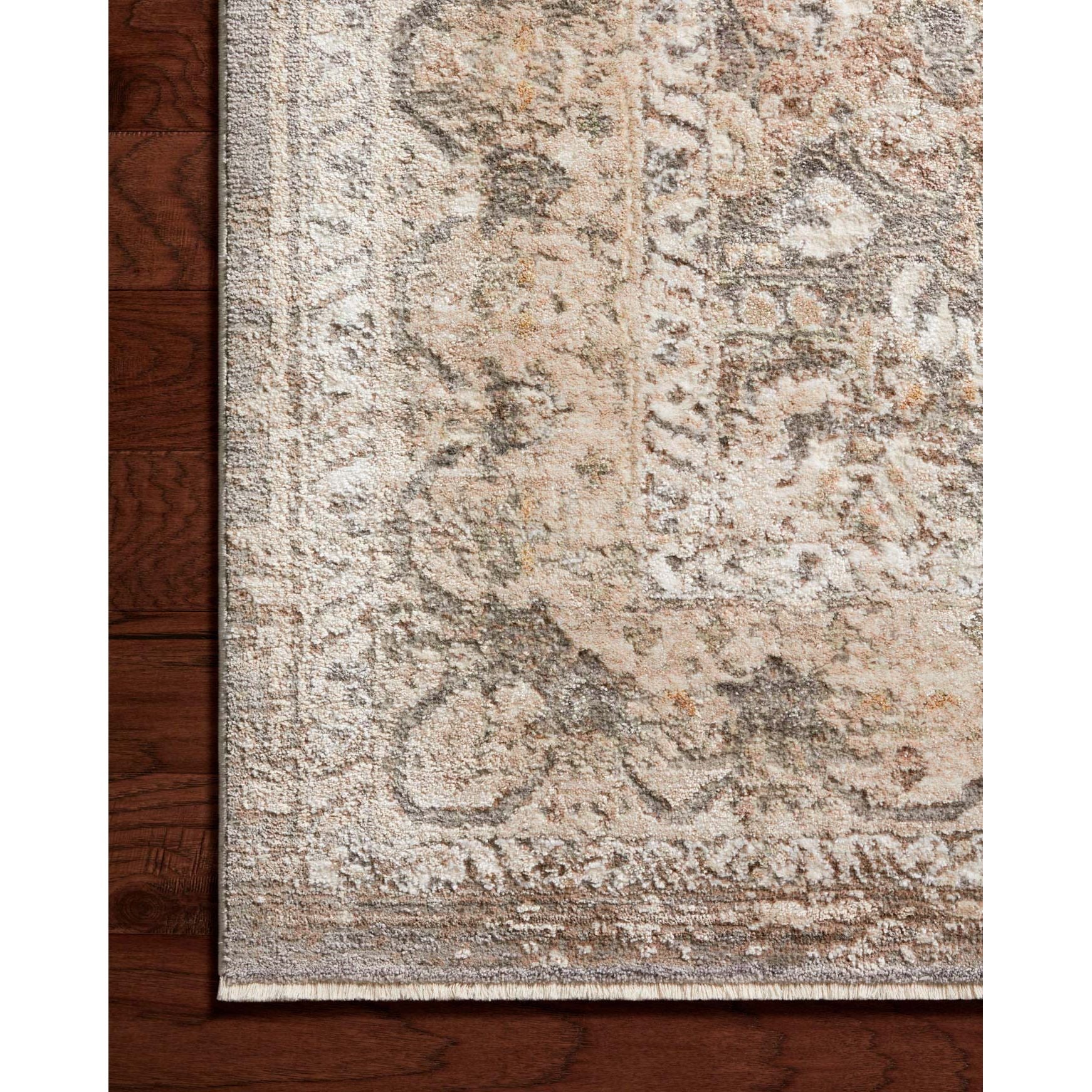 The Sonnet Collection is a versatile area rug with traditional motifs that appear to float and fade from the surface, the result of a new power-loomed construction that combines yarns of different textures. The rug is made of space-dyed polypropylene and polyester for a gradient range of colors that shift with the light. Amethyst Home provides interior design, new home construction design consulting, vintage area rugs, and lighting in the Seattle metro area.