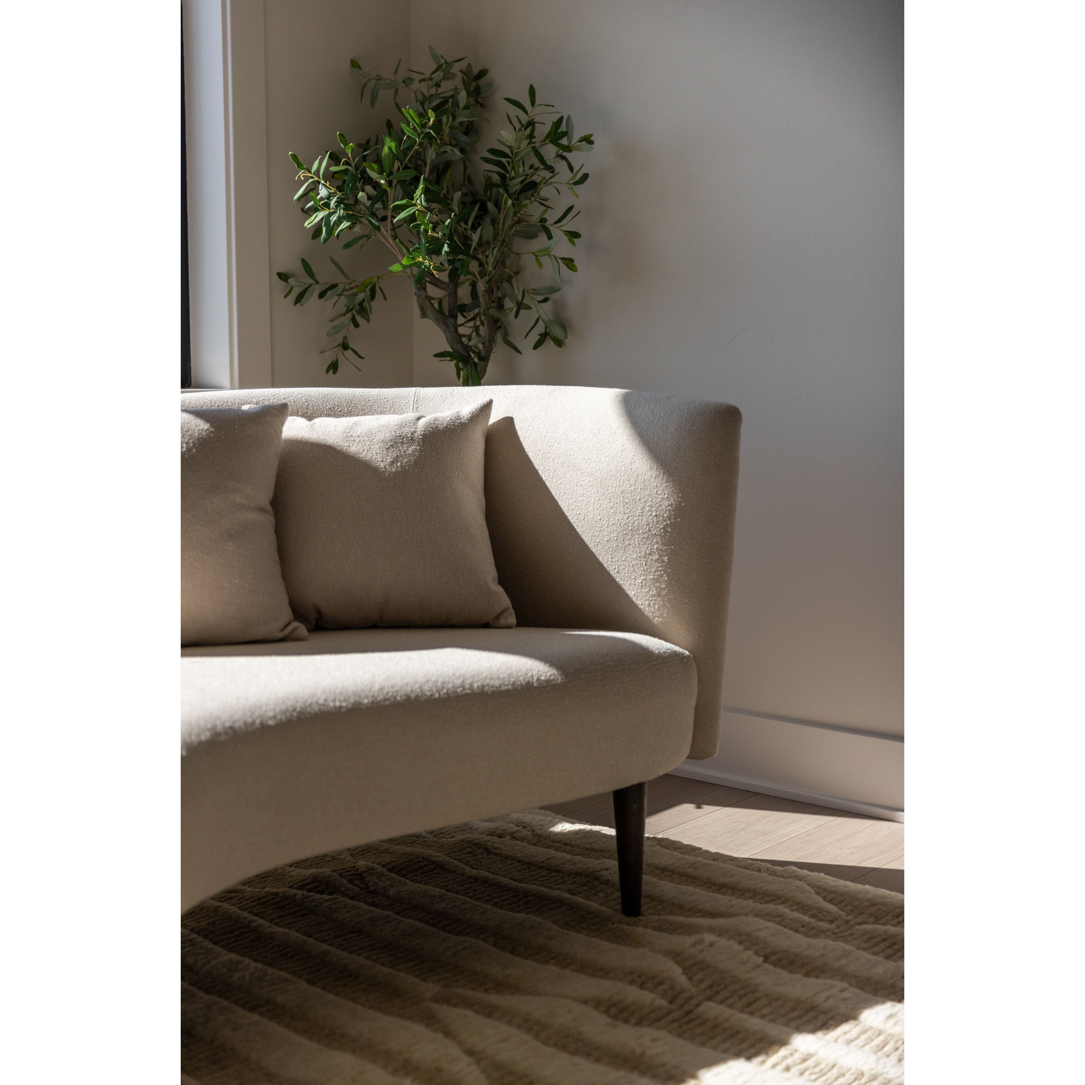 This curvy, Italian-inspired Luna Chaise exudes attitude. This features exclusive performance-grade ivory boucle in a striking, sultry S shape. Dual pillows for a fine finishing touch for any bedroom, office, or living room. Amethyst Home provides interior design, new home construction design consulting, vintage area rugs, and lighting in the Salt Lake City metro area.