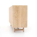 We love the grained matte finish on this Mika Washed Oak Veneer Dining Sideboard. The shelves make this the perfect sideboard for a functional, modernly attractive piece to add to your dining room  Size:  72.00"w x 16.00"d x 30.00"h Materials: Oak Veneer
