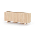 We love the grained matte finish on this Mika Washed Oak Veneer Dining Sideboard. The shelves make this the perfect sideboard for a functional, modernly attractive piece to add to your dining room  Size:  72.00"w x 16.00"d x 30.00"h Materials: Oak Veneer