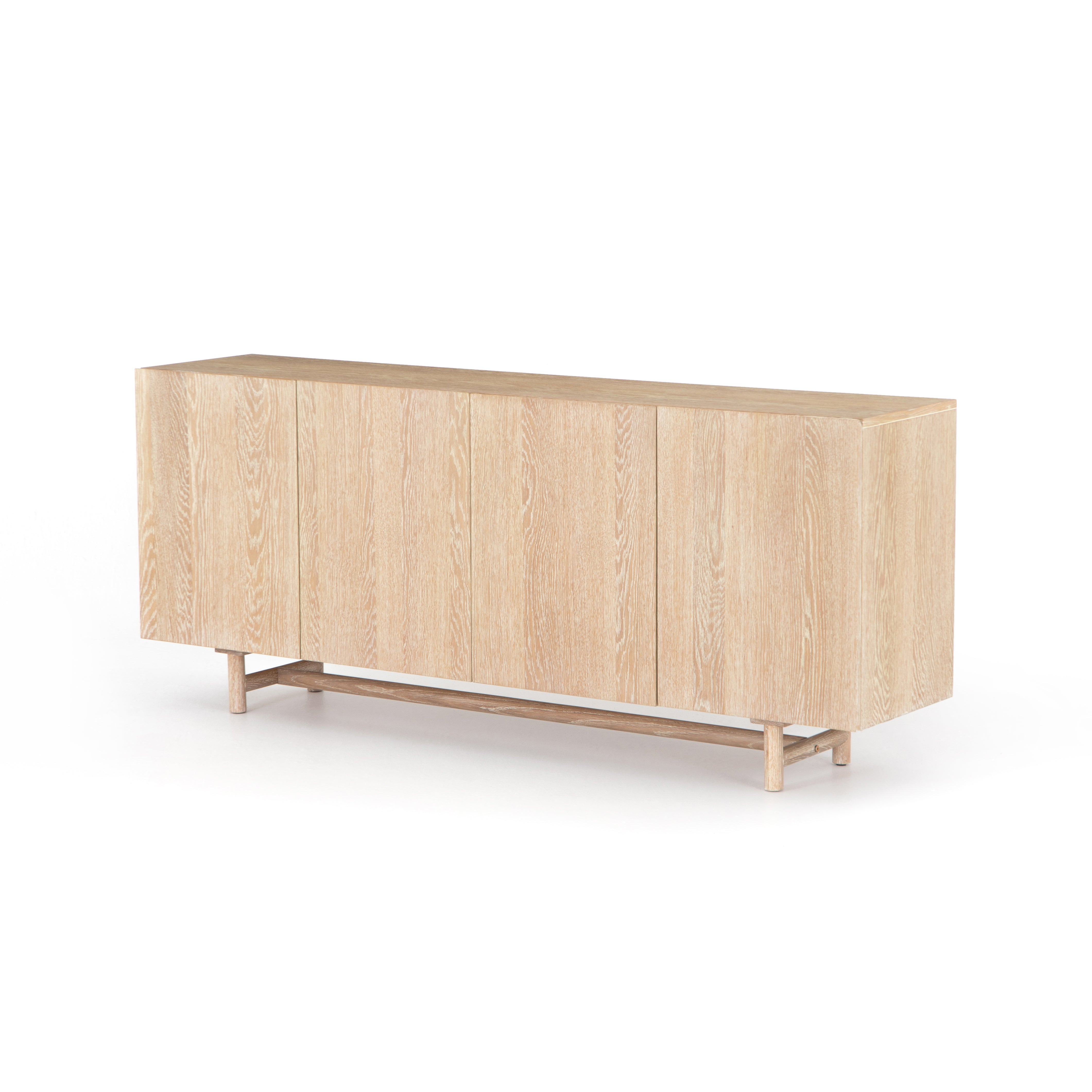 We love the grained matte finish on this Mika Washed Oak Veneer Dining Sideboard. The shelves make this the perfect sideboard for a functional, modernly attractive piece to add to your dining room  Size:  72.00"w x 16.00"d x 30.00"h Materials: Oak Veneer