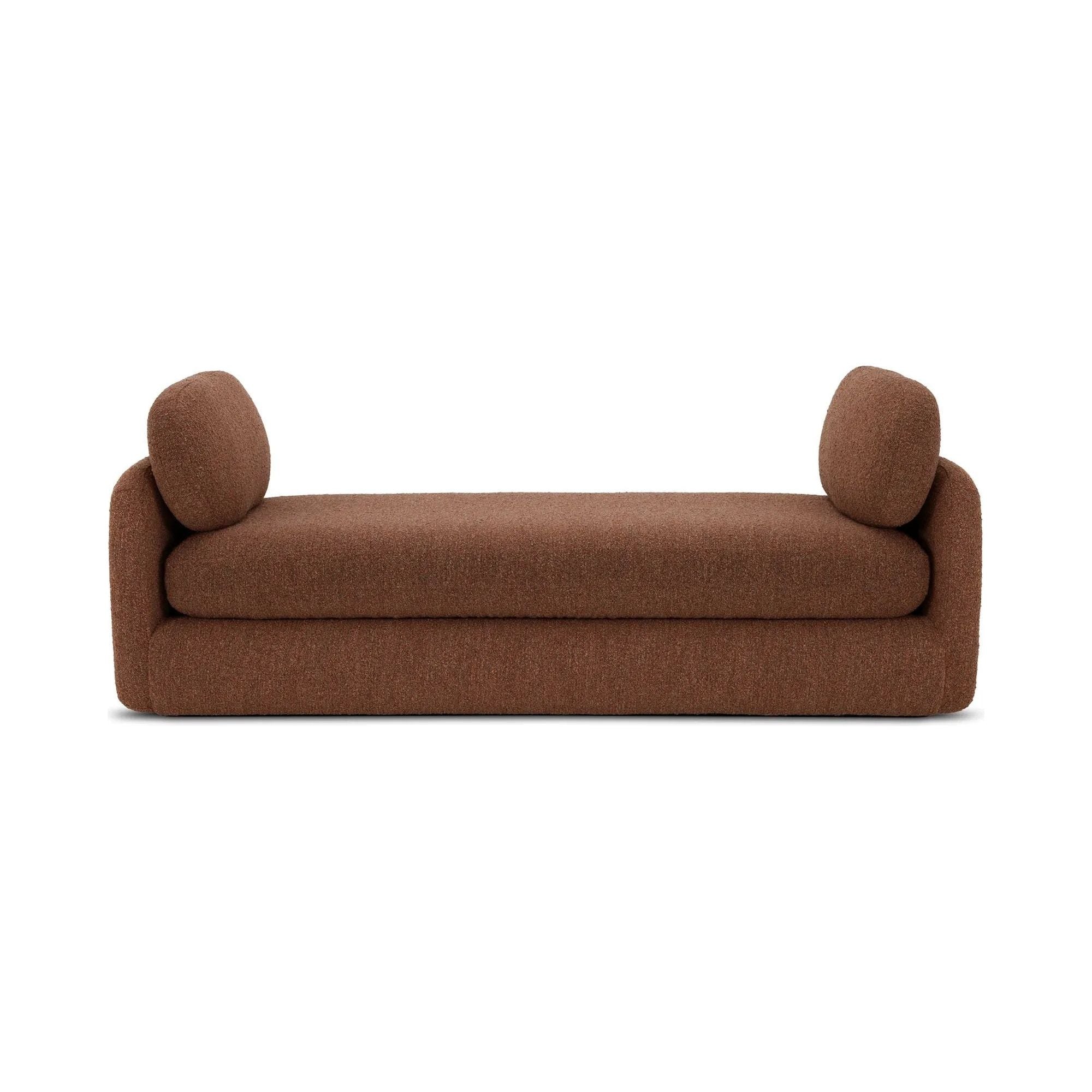 Inspired by the captivating styles of the 70s, the Scout daybed brings a piece of the past into the present. Clad in textured bouclé fabric, the chair merges visual allure and tactility. Its curved form, combined with a rounded and elongated cushion, introduces a touch of softness to any space, while the plump seat cushion promises modern comfort Amethyst Home provides interior design, new home construction design consulting, vintage area rugs, and lighting in the Charlotte metro area.