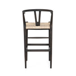 Featuring Muestra Counter + Bar Stool - Black Teak by Four Hands at Amethyst Home. Modern curves redefine the classic wishbone-style of this Muestra Black Teak Counter + Bar Stool. Vintage white all-weather wicker is woven for a dose of fresh texture within weathered grey teak framing. Cover or store indoors during inclement weather and when not in use.
Counte. Amethyst Home provides interior design, new home construction design consulting, vintage area rugs, and lighting in the Boston metro area.