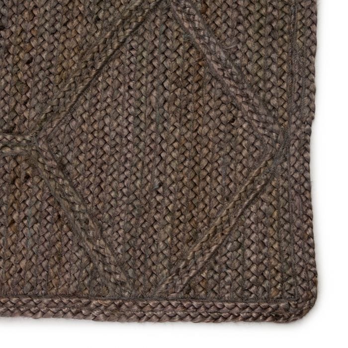 Featuring Naturals Tobago Ponce Rug by Jaipur Living at Amethyst Home. The Naturals Tobago collection delivers rich texture and organic allure to contemporary homes. Handwoven of jute, the Ponce area rug showcases a chic geometric trellis design. The mix of gray, taupe, and brown hues lend a deep natural tone to ground any space.
Handwoven 100% Jute NAT4.  Amethyst Home provides interior design, new home construction design consulting, vintage area rugs, and lighting in the Kansas City metro area.