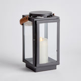 Featuring a real leather handle with tailored stitching, this well-scaled lantern is a mix of traditional and modern aesthetics. A beautiful accent for entryway, living room or study. Amethyst Home provides interior design, new construction, custom furniture, and area rugs in the Houston metro area.