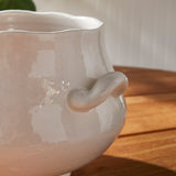 At first glance, the Wellon Cachepot looks like your average vessel, but the organic rim and curvy shape make it an instant classic. Pair with one of our hand-crafted drop-ins and the result is perfection. Amethyst Home provides interior design, new construction, custom furniture, and area rugs in the Laguna Beach metro area.