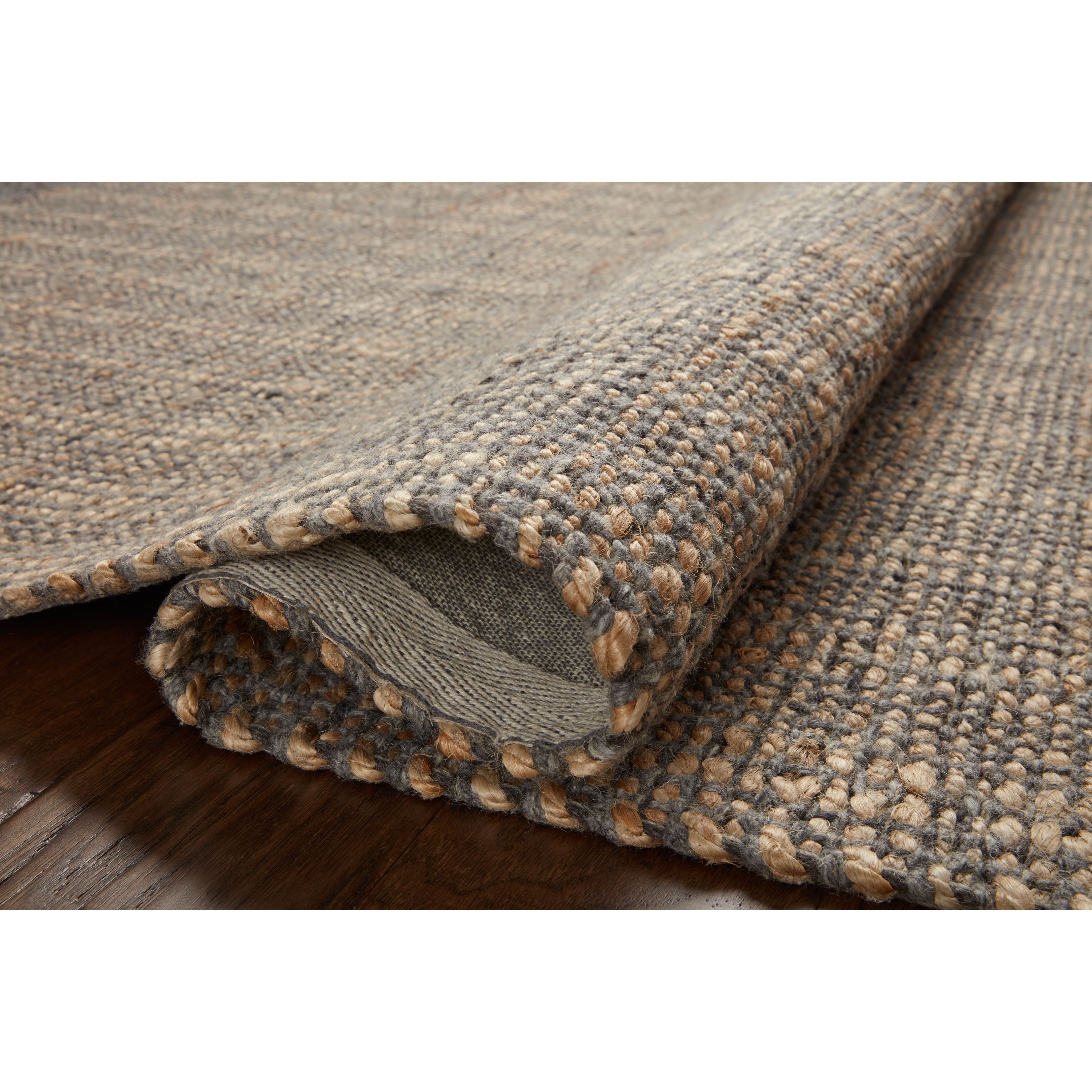 Featuring Jean Stoffer x Loloi Cornwall Charcoal / Natural Rug by Loloi at Amethyst Home. Hand-woven of jute and wool, the Cornwall Charcoal / Natural Rug has a natural, organic look with a clean and classic striped design. This area rug collection is an elegant neutral that styles easily in a range of living rooms, bedrooms, dining rooms, and even mudrooms. Soft, earth-toned . Amethyst Home provides interior design, new construction, custom furniture, and area rugs in the Laguna Beach metro area.