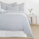 Soft and relaxed, the Henley is heavyweight cotton with a finely hand loomed texture and a thin interwoven stripe pattern. It creates a clean and casual look for your bedroom.  Made of 100% heavyweight cotton, featuring shell-button closures. Amethyst Home provides interior design, new home construction design consulting, vintage area rugs, and lighting in the Des Moines metro area.