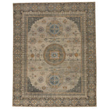 The Rhapsody Delpha Area Rug by Jaipur Living, or RHA05, boasts a beautiful medallion motif with a tile-like, decorative border detail. The light ivory tone is accented with rich green-blue, ochre, and sky blue hues. This durable wool hand knotted rug is perfect for the living room or other high traffic areas. 