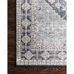 Featuring Skye Charcoal/Multi Rug by Loloi at Amethyst Home. The Skye Charcoal/Multi area rug from Loloi captures the spirit of a one-of-a-kind vintage or antique area rug. You will love this rug because the rug is: 

Perfect for families with kids and pets
Very easy to clean and maintain
Comes in big area rug sizes and as cute kitchen and hallway runners.  Amethyst Home provides interior design, new home construction design consulting, vintage area rugs, and lighting in the Des Moines metro area.
