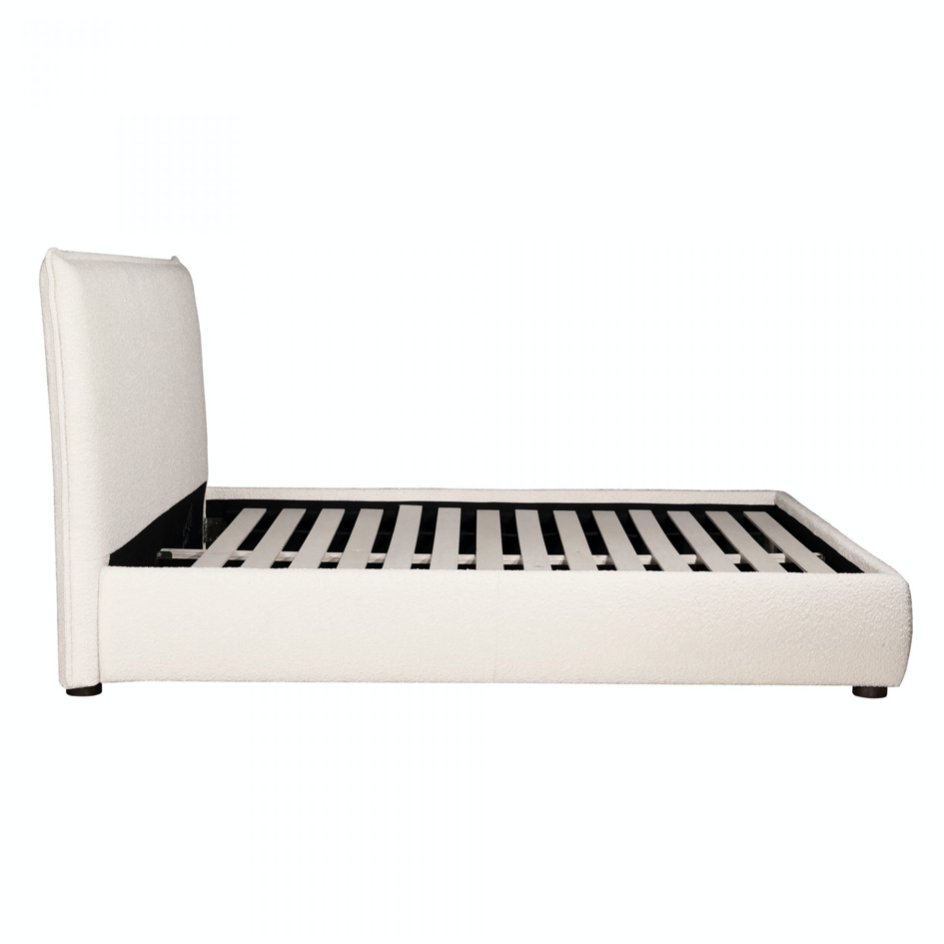 The Recharge King Bed is made of creamy boucle, giving us all the textured feels. The padded sides and headboard bring a sense of calm and comfort to any bedroom Size: 35"w x 20"d x 16"h Materials: Iron