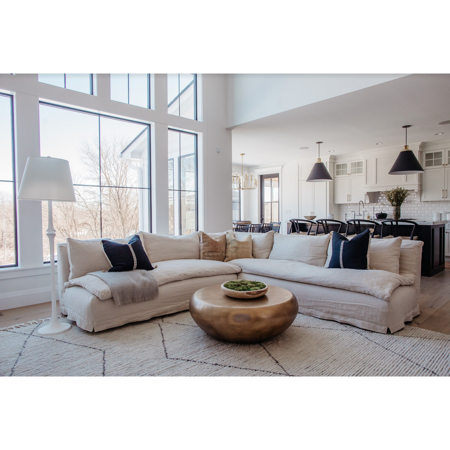 A casual, slipcovered chunky linen sectional by Cisco Brothers, the Laguna 2pc Sectional is the ultimate in casual luxury.A down-filled seat cushion is supported by springs in a gentle, resting position.  Pair with a one-of-a-kind statement rug for a signature look. Shown in Otis White 100% linen. Amethyst Home provides interior design, new home construction design consulting, vintage area rugs, and lighting in the Nashville metro area.