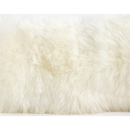 The Lalo Lambskin Lumbar Pillow with an insert is made of 100% unshorn sheepskin and brings all the texture to your bedroom or living room sofa. Amethyst Home provides interior design, new home construction design consulting, vintage area rugs, and lighting in the Houston metro area.