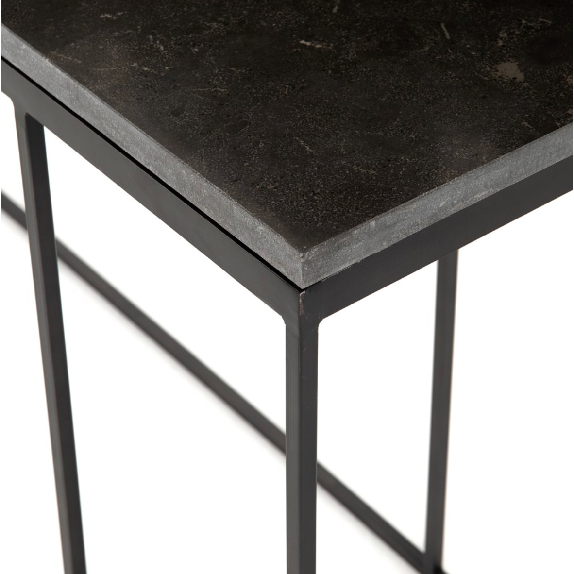 Spare beauty, casual elegance. A gunmetal Parson’s base with hand-rubbed, dimensional edges supports a rough-hewn bluestone slab that feels found and perfectly placed.  Dimensions: 60"w x 17"d x 32"h Materials: Iron, Bluestone Colors: Gunmetal, Bluestone