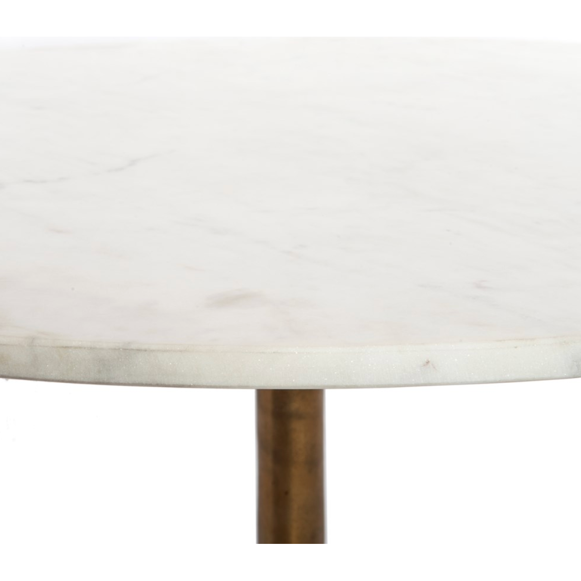 Simple, sophisticated style. The Helen Round Coffee Table has a slim tripod base of raw brass supports a rounded tabletop of polished white marble. Petite scale perfect for smaller spaces or rooms with a sectional.