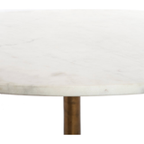 Featuring Helen Round Coffee Table by Four Hands at Amethyst Home. Simple, sophisticated style. The Helen Round Coffee Table has a slim tripod base of raw brass supports a rounded tabletop of polished white marble. Petite scale perfect for smaller spaces or rooms with a sectional.
Overall Dimensions: 32"W x 32"L x 16.50"H

Colors: Raw Brass, Polished White.  Amethyst Home provides interior design, new home construction design consulting, vintage area rugs, and lighting in the San Diego metro area.