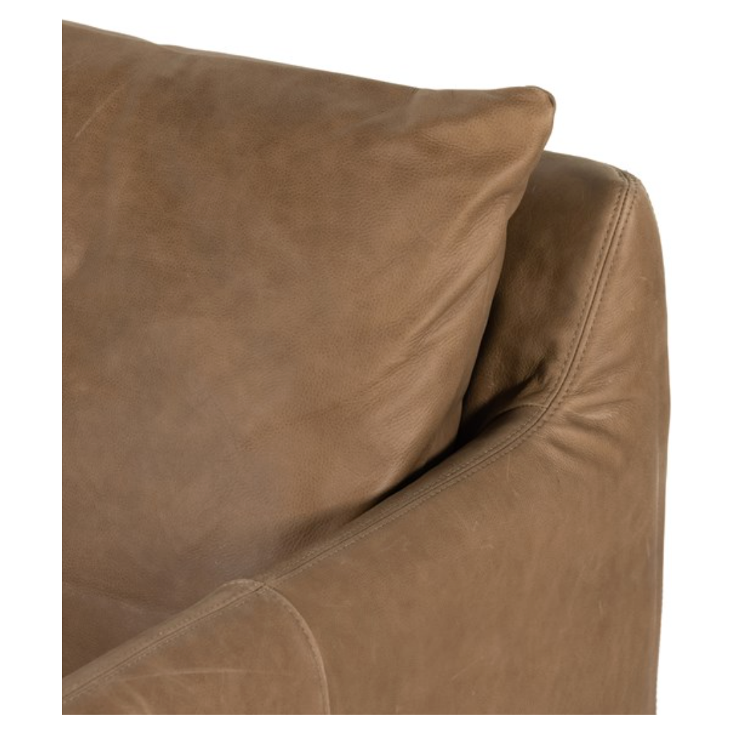 The Freddy Leather Swivel Chair is a slipcovered, leather swivel chair -- perfect for moody rooms. The chair features a comfortable, plush back and supportive seat. Please expect natural distressing. Amethyst Home provides interior design, new home construction design consulting, vintage area rugs, and lighting in the Boston metro area.