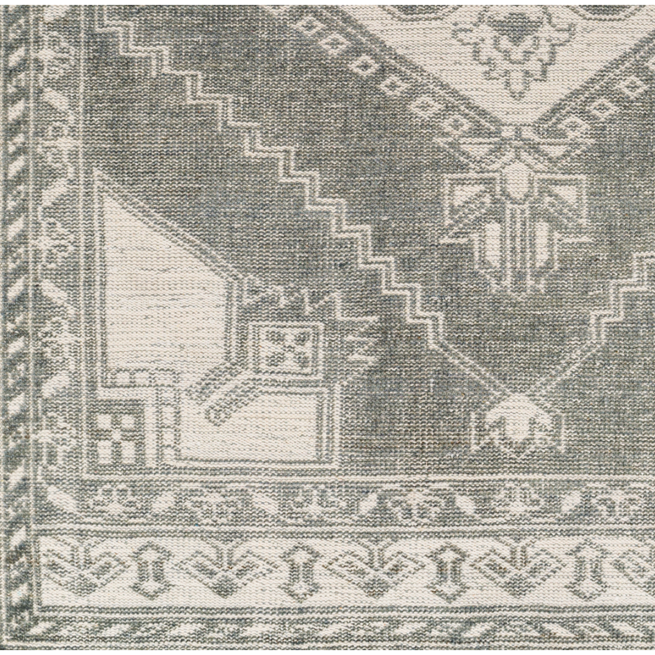 Featuring Zahra Charcoal Hand-Knotted Rug by Surya at Amethyst Home. The Zahra Collection showcases traditional inspired designs that exemplify timeless styles of elegance, comfort, and sophistication. With their hand knotted construction, these rugs provide a durability that can not be found in other handmade constructions, and boasts the ability to be thorou.  Amethyst Home provides interior design, new home construction design consulting, vintage area rugs, and lighting in the Omaha metro area.