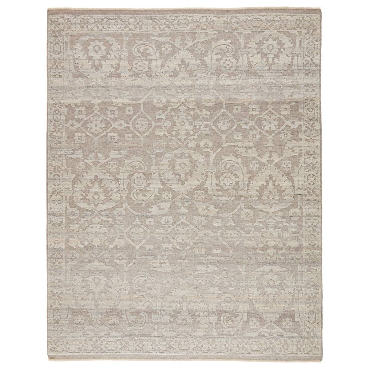 The Sonnette Ayres Area Rug by Jaipur Living, or SNN03, boasts a neutral palette of light taupe and gray that creates beautiful dimension among the brocade design. This hand-knotted wool rug features fringe trimmed details for a touch of global charm. A gorgeous choice for your bedroom or other medium traffic areas. 