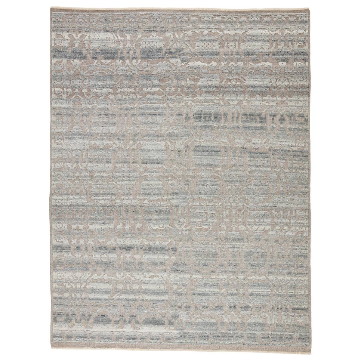 The Sonnette Pearson Area Rug combines an inviting, soft hand and stunning transitional style. The hand-knotted Sonnette area rug has gorgeous tonal grays and creams with a subtle design. The fringe trimmed detail adds a touch of global charm. A gorgeous choice for your bedroom, office, or other medium traffic areas.