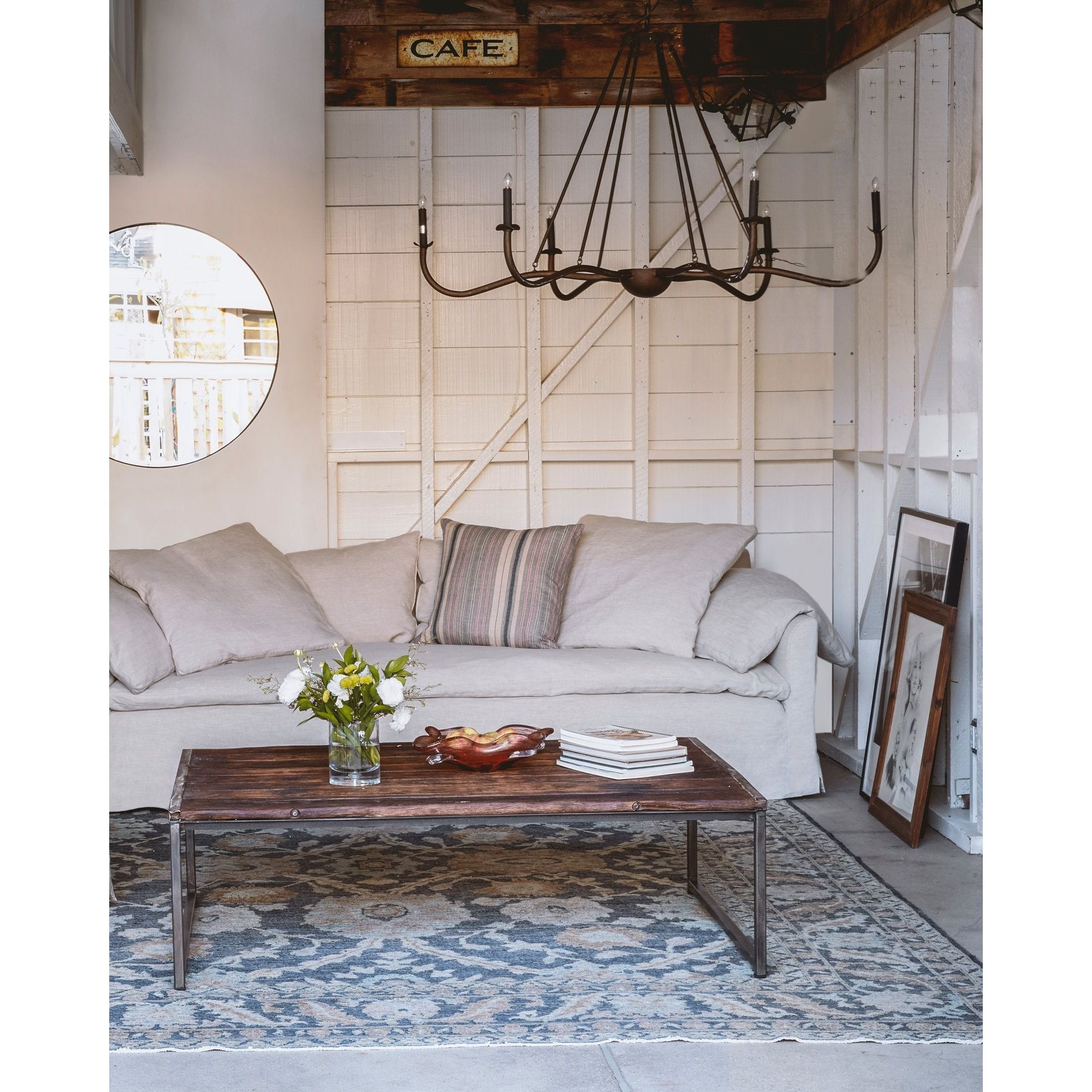 Add unique and modern lighting to a room with this Spider Chandelier from Cisco Brothers. The curved arms add beautiful sight lines to the fixture and plenty of light. This light fixture sets any room apart and comes available in either a "rust" or "flat black" finish in three different sizes.