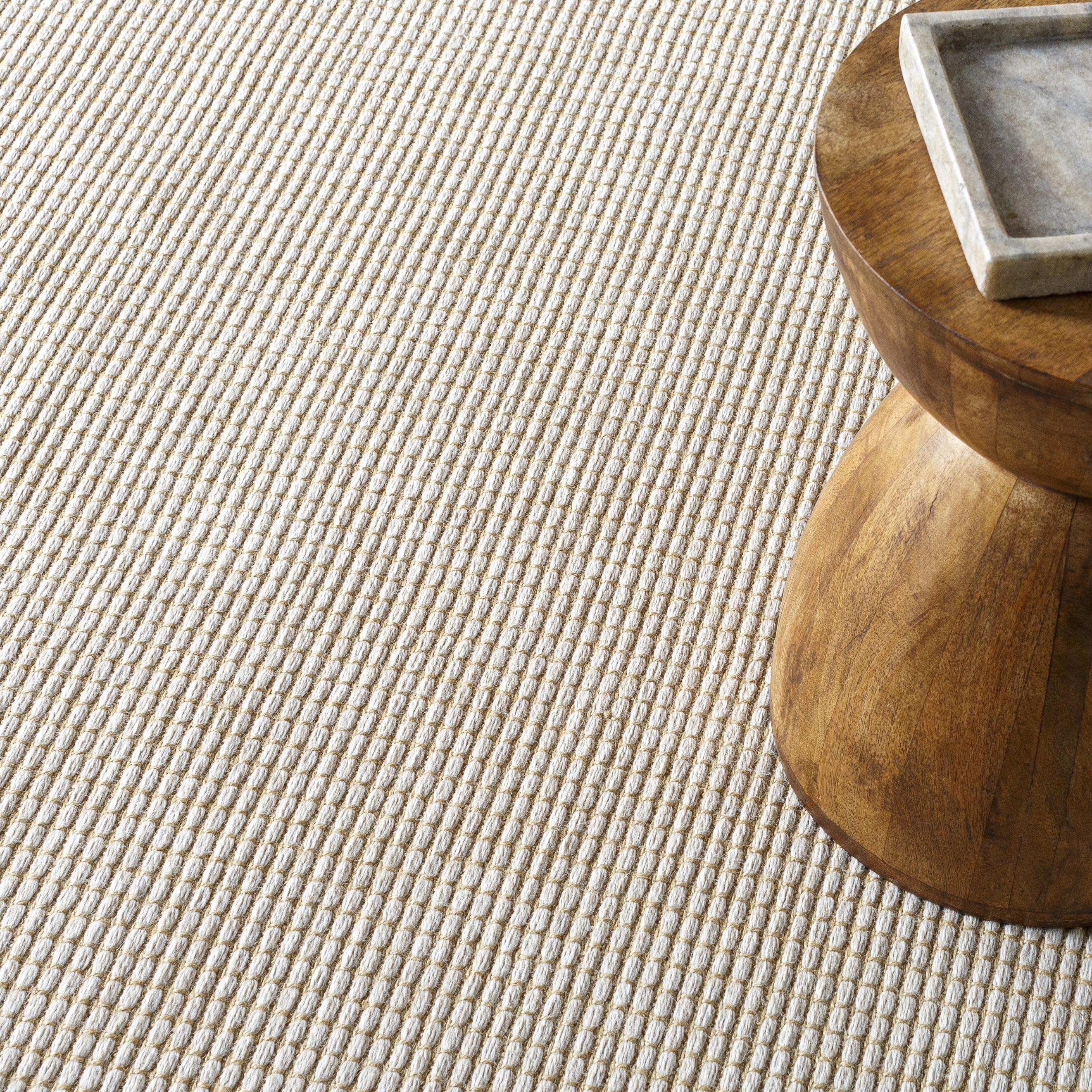 Featuring Becki Owens x Surya Kimi Light Beige Rug by Surya at Amethyst Home. This unique and exquisite Kimi area rug is a special collaboration piece from our Becki Owens x Surya line. The perfect addition to any space, this beautiful rug features a unique stitched design made of polypropylene and jute. Its main colors of natural and beige add a textural wo. Amethyst Home provides interior design, new home construction design consulting, vintage area rugs, and lighting in the Monterey metro area.