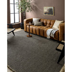 This beautiful Kimi area rug is the perfect addition to any room in your home. The special collaboration between Surya and Becki Owens has created a unique, eye-catching design that will bring texture and style to your space. The rug is made from polypropylene and jute, creating a textural woven pattern in natural tones with dark contrast. Amethyst Home provides interior design, new home construction design consulting, vintage area rugs, and lighting in the Omaha metro area.