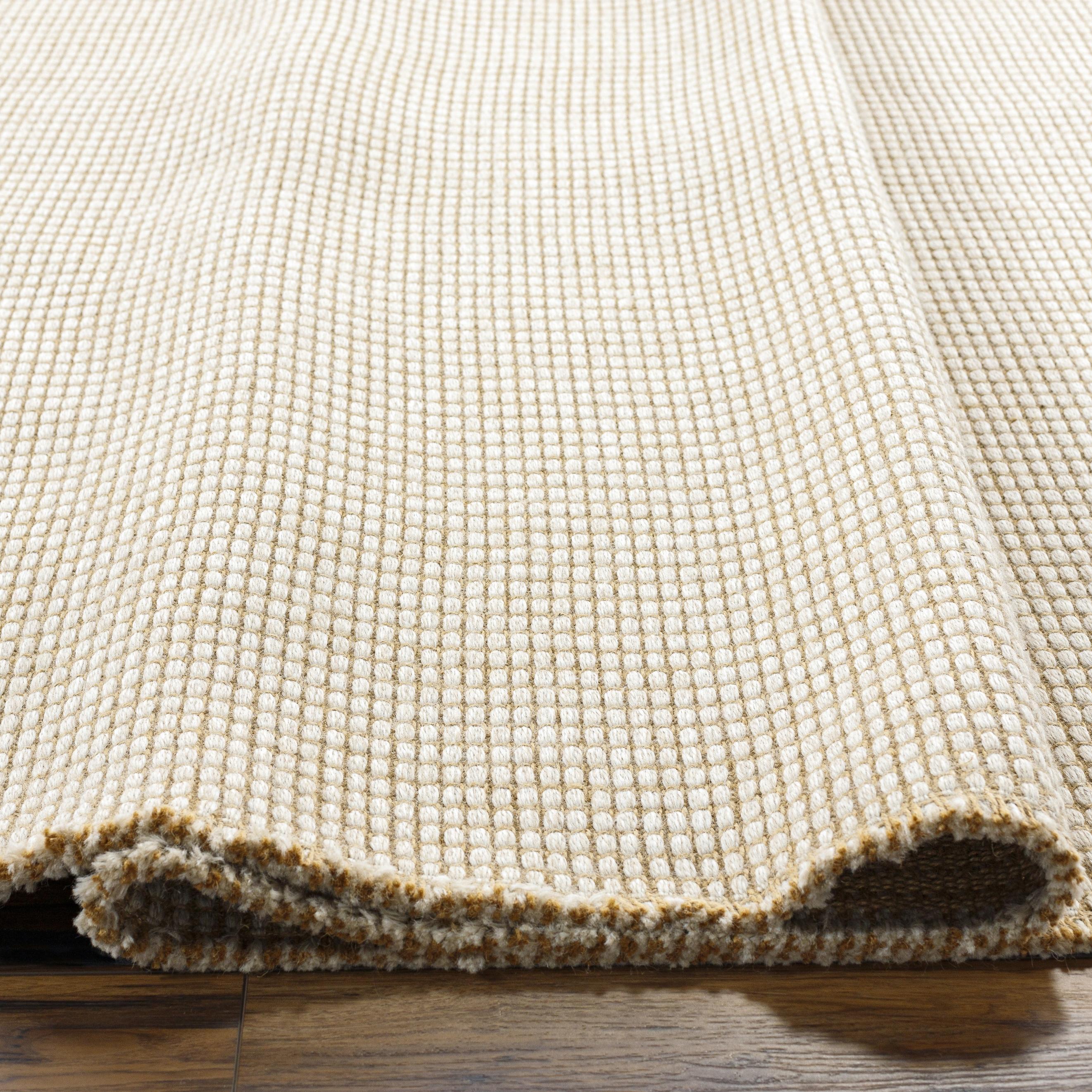 Featuring Becki Owens x Surya Kimi Light Beige Rug by Surya at Amethyst Home. This unique and exquisite Kimi area rug is a special collaboration piece from our Becki Owens x Surya line. The perfect addition to any space, this beautiful rug features a unique stitched design made of polypropylene and jute. Its main colors of natural and beige add a textural w. Amethyst Home provides interior design, new home construction design consulting, vintage area rugs, and lighting in the Park City metro area.