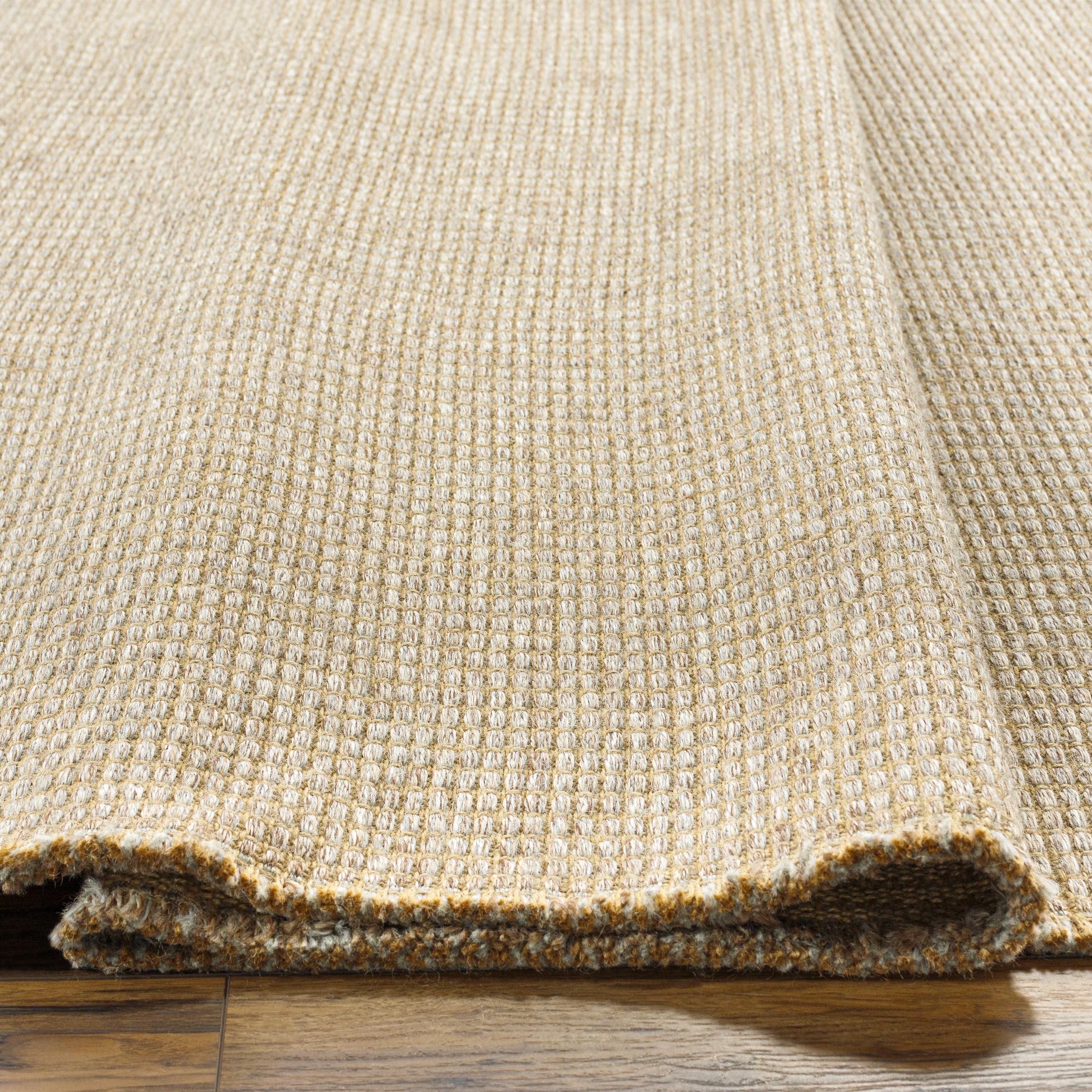 Featuring Becki Owens x Surya Kimi Brown/Gray Rug by Surya at Amethyst Home. This exquisite Kimi area rug from our Becki Owens x Surya line is the perfect combination of style and comfort. Crafted from a unique blend of polypropylene and jute, this rug features a beautiful stitched design that will bring a touch of elegance to any space. The main colors are n. Amethyst Home provides interior design, new home construction design consulting, vintage area rugs, and lighting in the Seattle metro area.