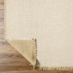 Featuring Becki Owens x Surya Kimi Light Beige Rug by Surya at Amethyst Home. This unique and exquisite Kimi area rug is a special collaboration piece from our Becki Owens x Surya line. The perfect addition to any space, this beautiful rug features a unique stitched design made of polypropylene and jute. Its main colors of natural and beige add a textural woven. Amethyst Home provides interior design, new home construction design consulting, vintage area rugs, and lighting in the Tampa metro area.