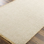 Featuring Becki Owens x Surya Kimi Light Beige Rug by Surya at Amethyst Home. This unique and exquisite Kimi area rug is a special collaboration piece from our Becki Owens x Surya line. The perfect addition to any space, this beautiful rug features a unique stitched design made of polypropylene and jute. Its main colors of natural and beige add a textur. Amethyst Home provides interior design, new home construction design consulting, vintage area rugs, and lighting in the Winter Garden metro area.