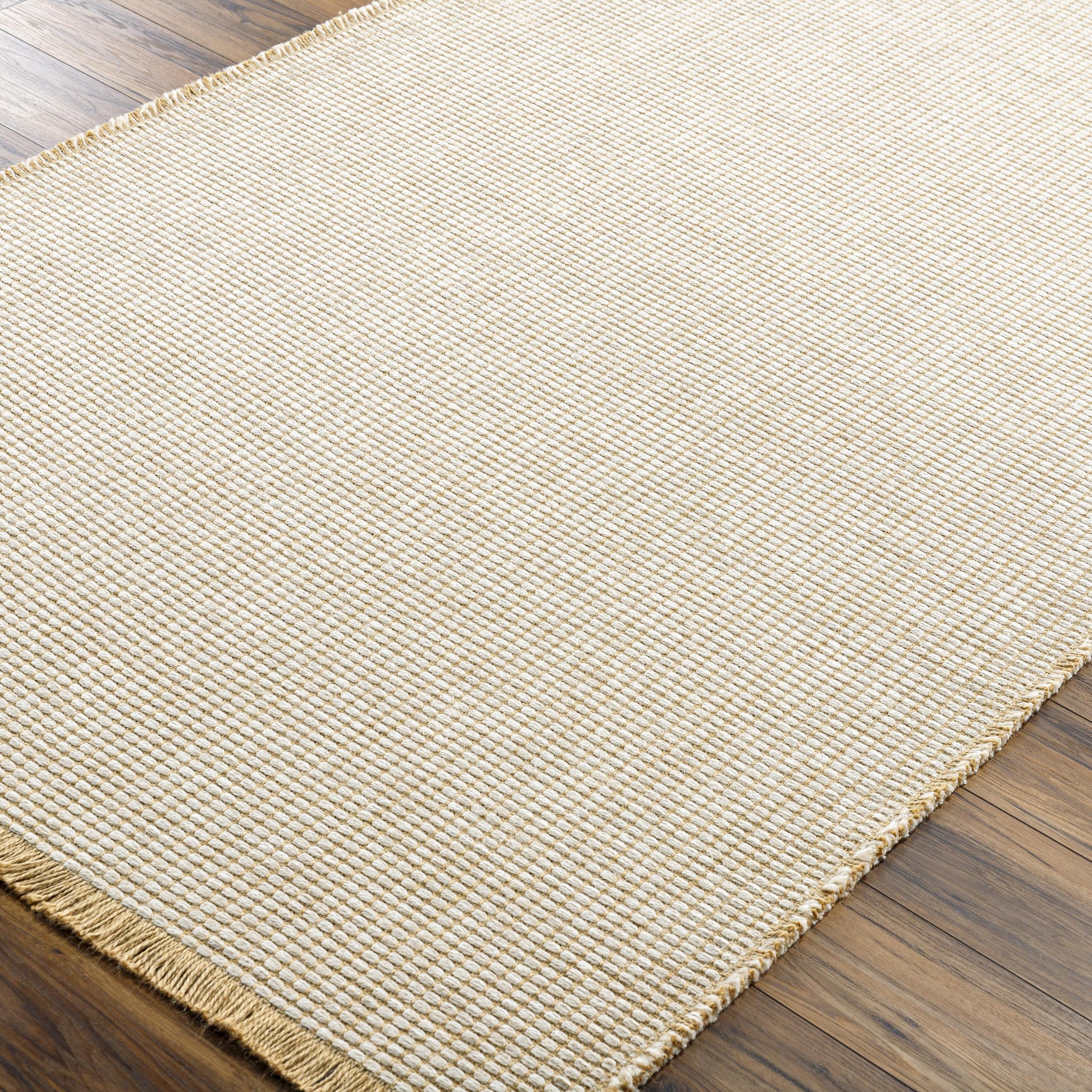 Featuring Becki Owens x Surya Kimi Light Beige Rug by Surya at Amethyst Home. This unique and exquisite Kimi area rug is a special collaboration piece from our Becki Owens x Surya line. The perfect addition to any space, this beautiful rug features a unique stitched design made of polypropylene and jute. Its main colors of natural and beige add a textur. Amethyst Home provides interior design, new home construction design consulting, vintage area rugs, and lighting in the Winter Garden metro area.
