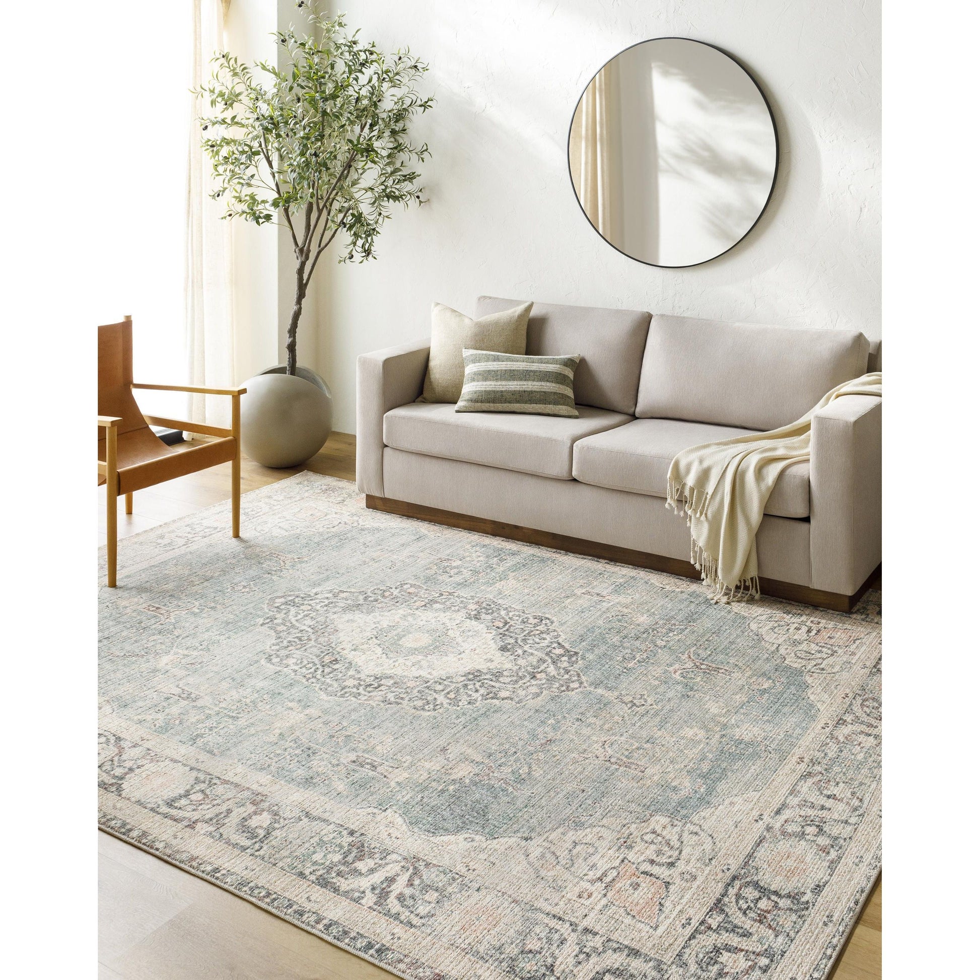 Welcome the Marlene area rug into your home and let it be the center of attention! This traditional style rug, designed as a special collaboration piece between Surya and Becki Owens, is a timeless masterpiece perfect for any room. Amethyst Home provides interior design, new home construction design consulting, vintage area rugs, and lighting in the Houston metro area.