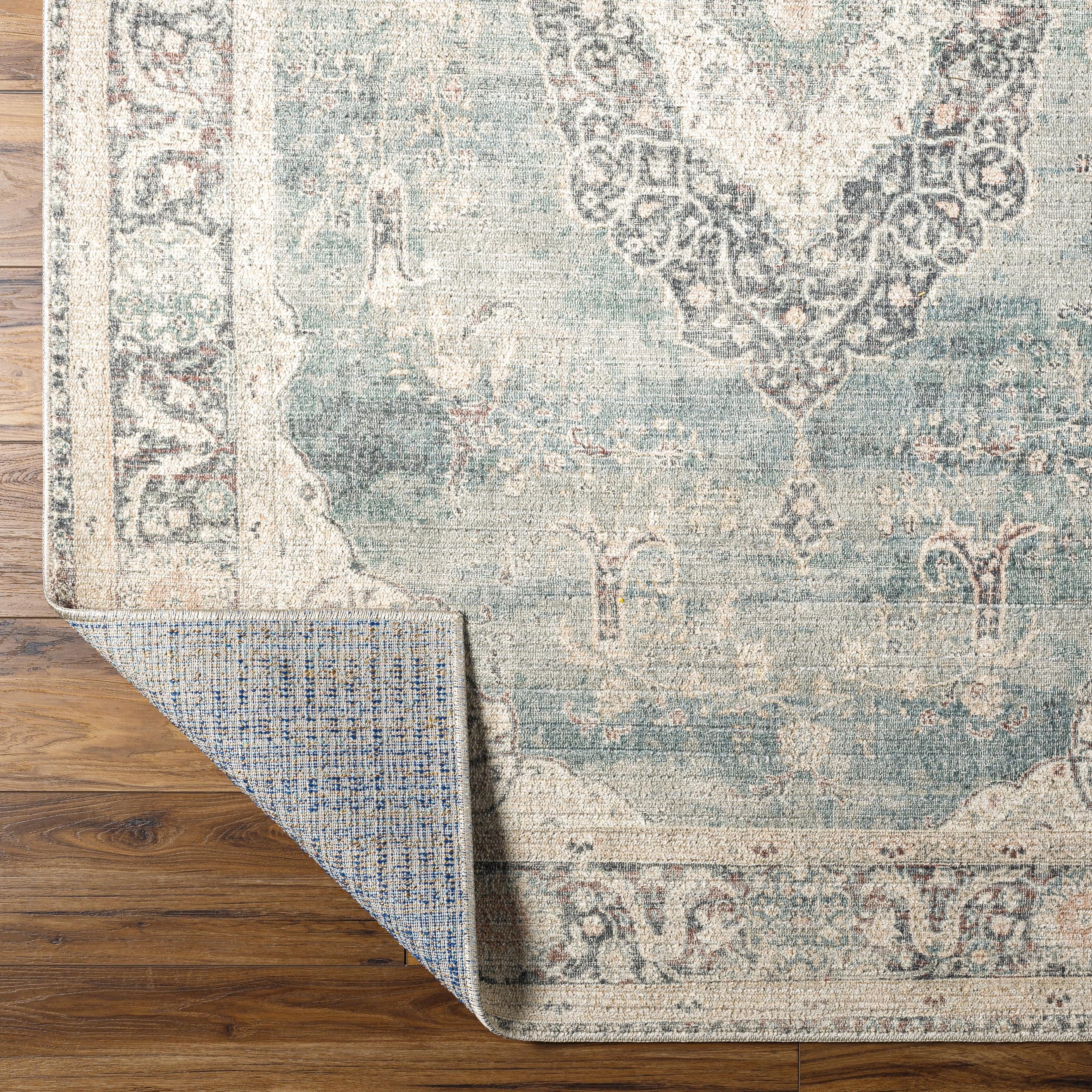 Welcome the Marlene area rug into your home and let it be the center of attention! This traditional style rug, designed as a special collaboration piece between Surya and Becki Owens, is a timeless masterpiece perfect for any room. Amethyst Home provides interior design, new home construction design consulting, vintage area rugs, and lighting in the Scottsdale metro area.