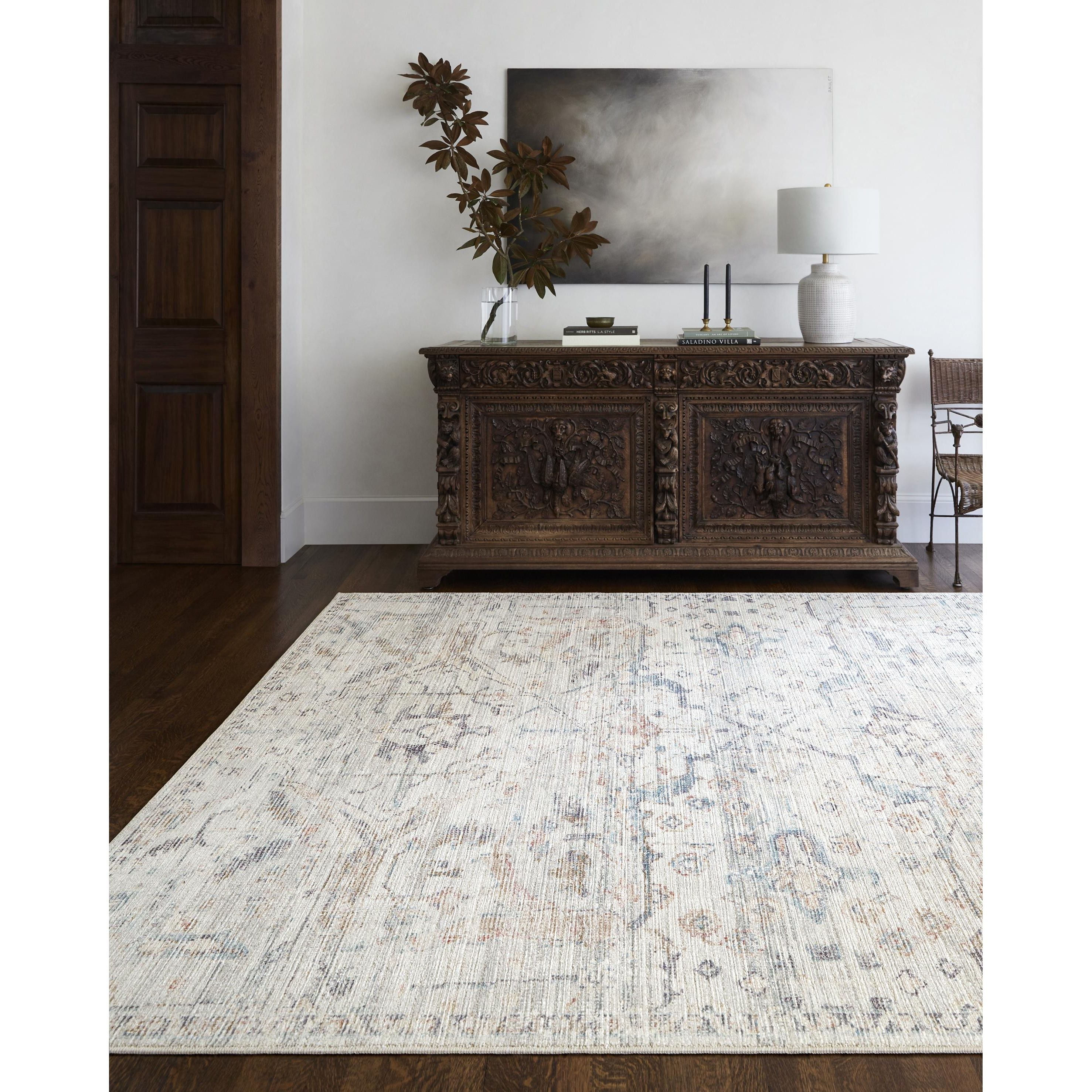 Introducing the Marlene area rug, a stunning piece of artistry crafted by the collaboration of Surya and Becki Owens. This unique and elegant design features beautiful blue tones that will bring a serene ambiance to any space. Amethyst Home provides interior design, new home construction design consulting, vintage area rugs, and lighting in the Des Moines metro area.