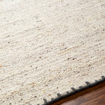 Featuring Berkeley Natural / Charcoal Rug by Surya at Amethyst Home. Pleasantly soft to the touch, this organic flecked wool rug is perfect for a minimalist look.  The unique stitching is our favorite part!  Simply vacuum regularly and clean spills with soap and water.
Hand WovenWoolBKY-2300. Amethyst Home provides interior design, new construction, custom furniture, and rugs for Austin metro area