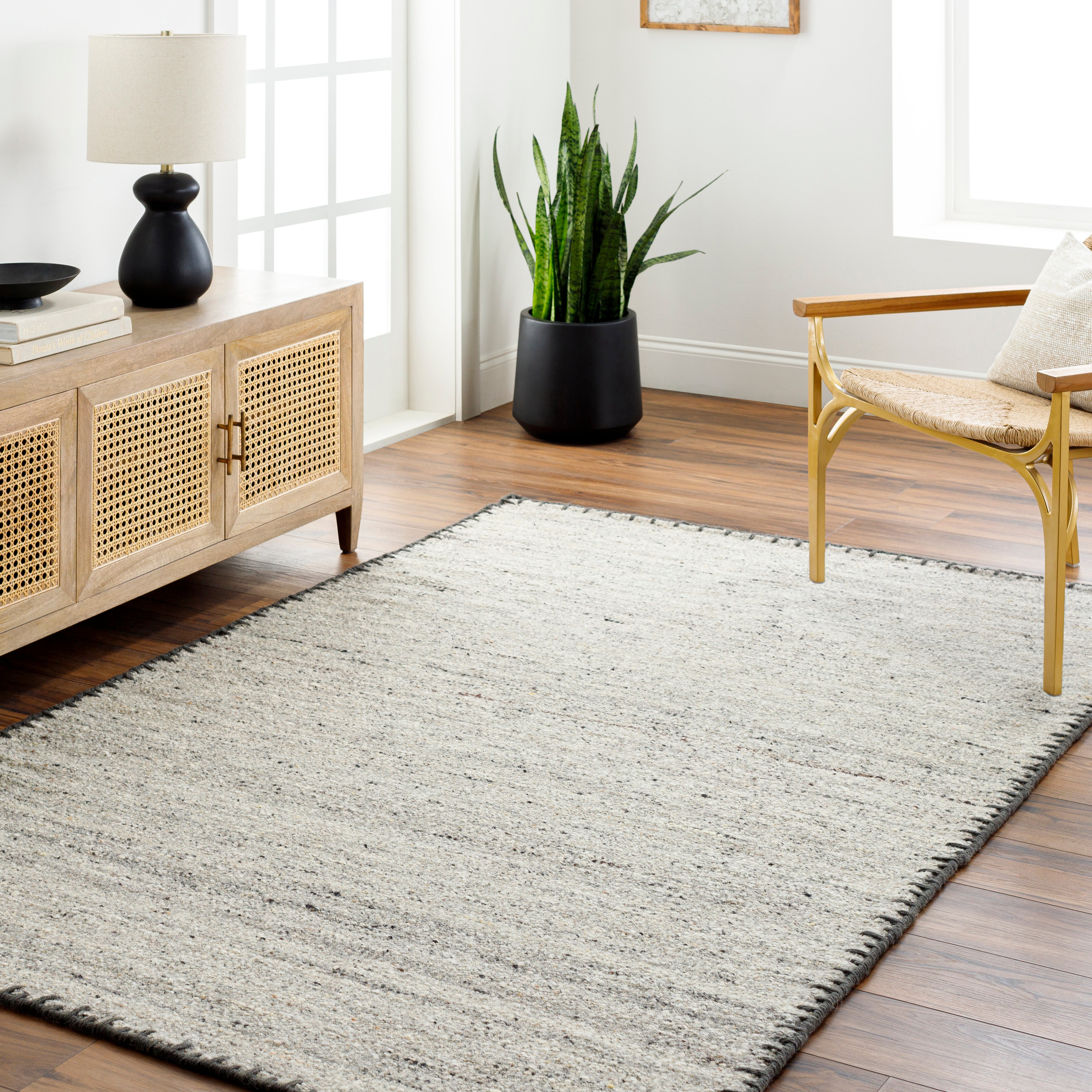 Featuring Berkeley Charcoal Rug by Surya at Amethyst Home. The Berkeley Rug Collection features compelling global inspired designs brimming with elegance and grace! The perfect addition for any home, these pieces will add eclectic charm to any room! The meticulously woven construction of these pieces boasts durability and will provide natural charm into your decor space. Made with Wool i. Amethyst Home provides interior design, new construction, custom furniture, and rugs for Alpharetta metro area