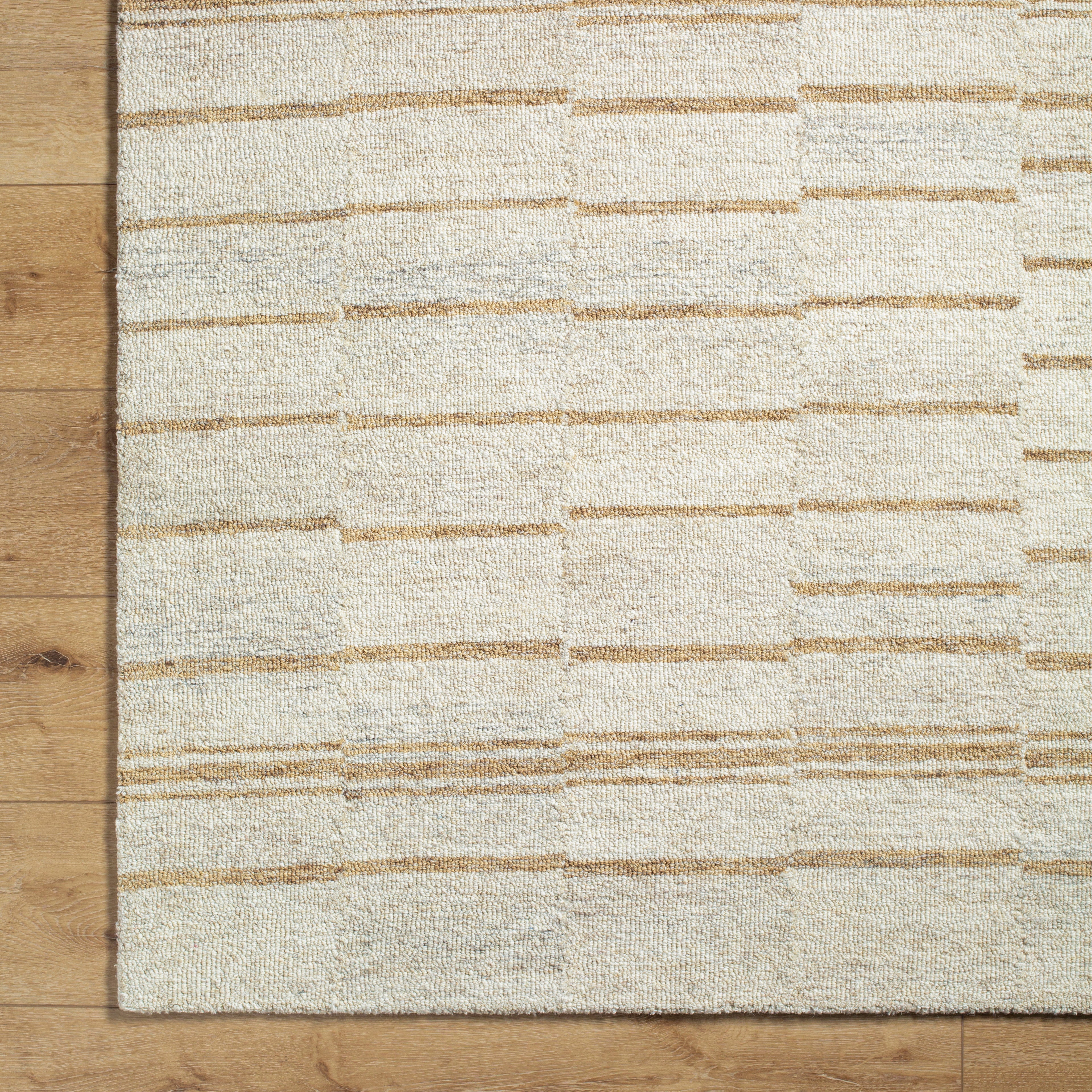 Featuring Granada Rug by Surya at Amethyst Home. The Granada Rug Collection showcases traditional inspired designs that exemplify timeless styles of elegance, comfort, and sophistication. With their hand tufted construction, these rugs offer an affordable alternative to other handmade constructions while preserving the same natural demeanor and charm. Mad. Amethyst Home provides interior design, new home construction design consulting, vintage area rugs, and lighting in the Kansas City metro area.