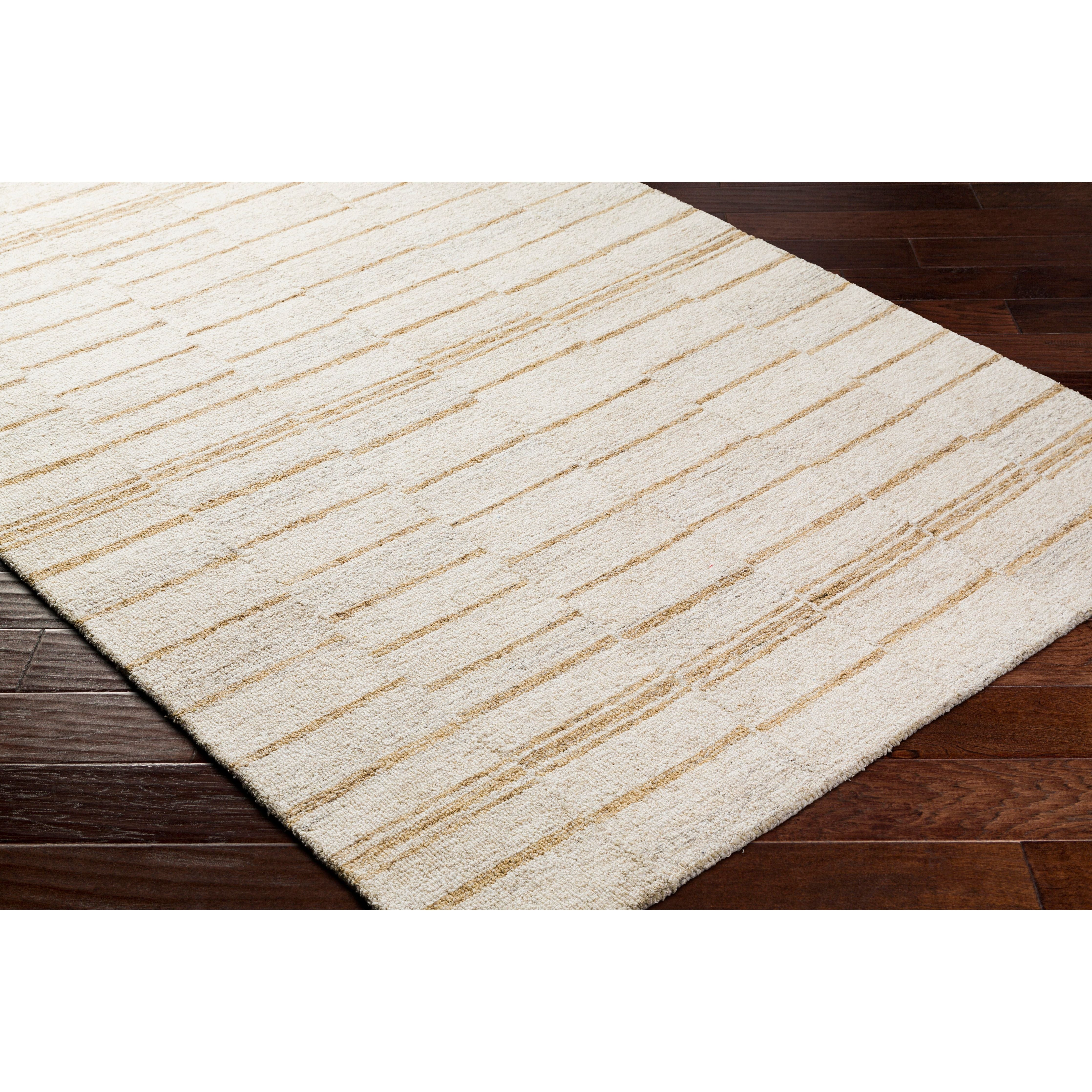 Featuring Granada Rug by Surya at Amethyst Home. The Granada Rug Collection showcases traditional inspired designs that exemplify timeless styles of elegance, comfort, and sophistication. With their hand tufted construction, these rugs offer an affordable alternative to other handmade constructions while preserving the same natural demeanor and charm. Made. Amethyst Home provides interior design, new home construction design consulting, vintage area rugs, and lighting in the Scottsdale metro area.